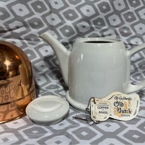 White Teapot with Copper Cozy